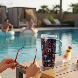 Swig Navy Tumbler with Colorful Bow Design 22oz